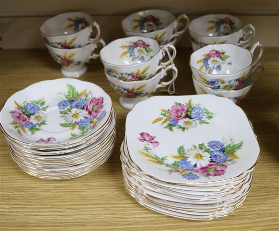 A Royal Albert Harvest-Bouquet pattern china tea service including ten tea cups, ten saucers and ten plates